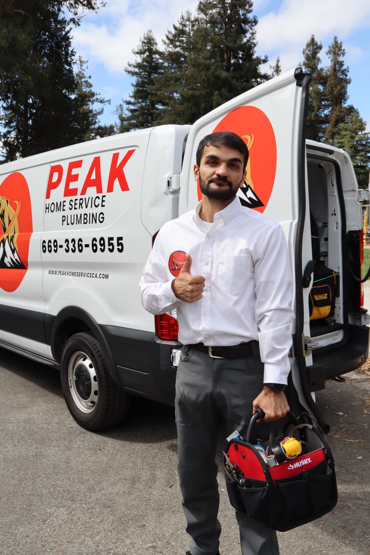 Saba loading the PEAK Home Service van for the day