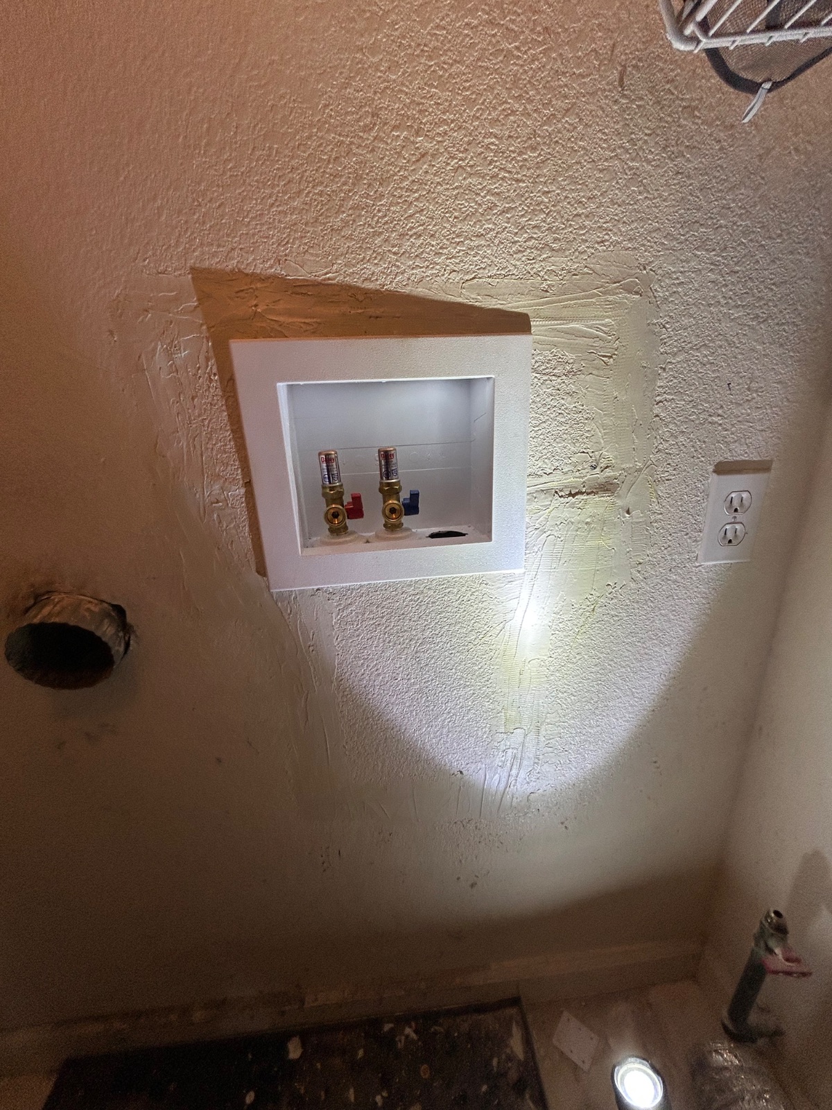 Finished laundry box installation by PEAK Home Service