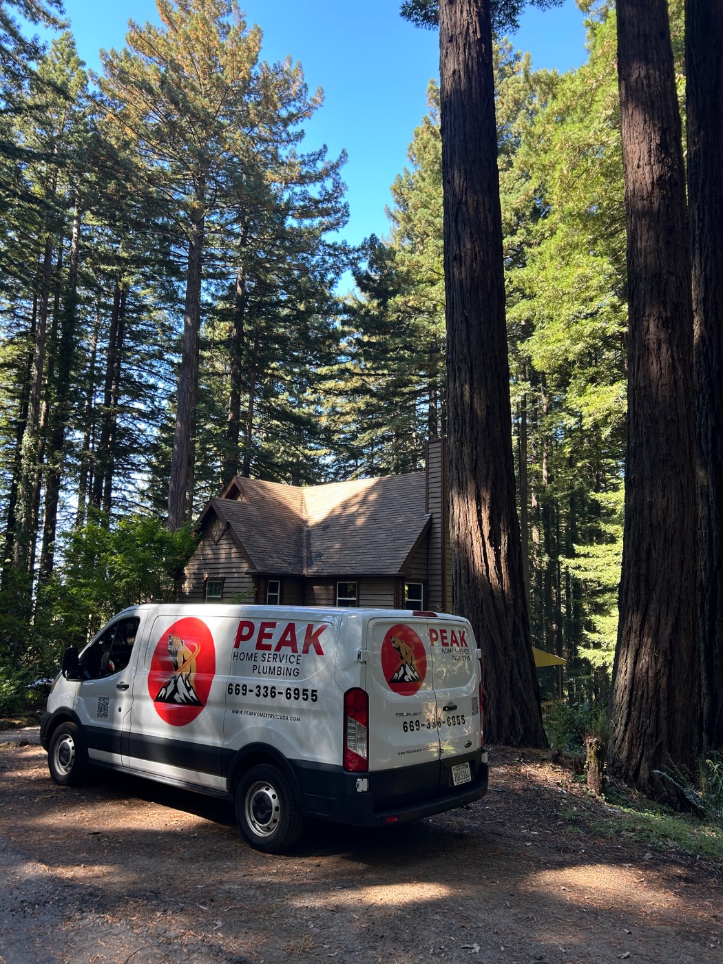 PEAK Home Service van parked at a client home among redwoods in the Bay Area